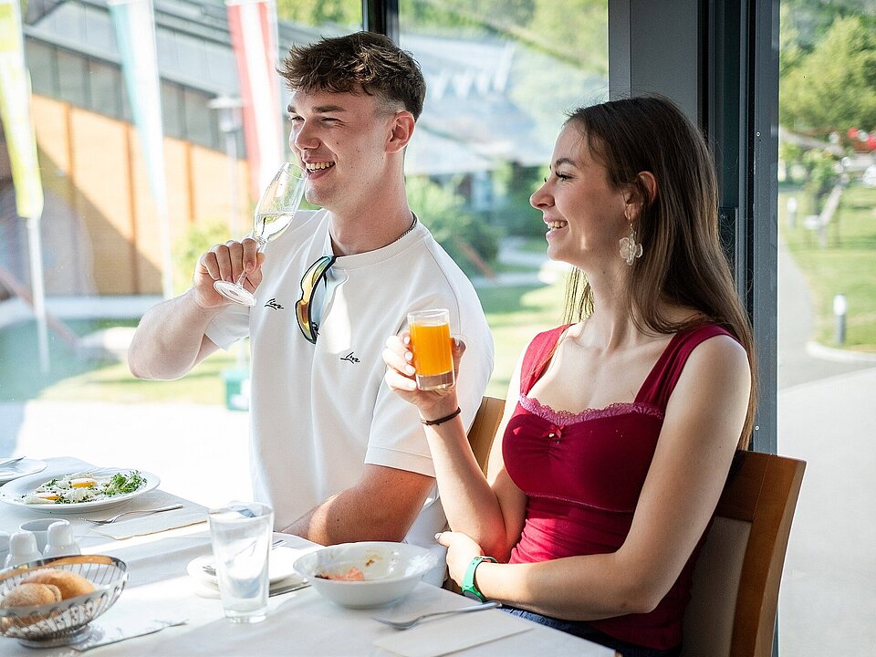 Young farmers enjoying breakfast at Thermenhotel Vier Jahreszeiten.
